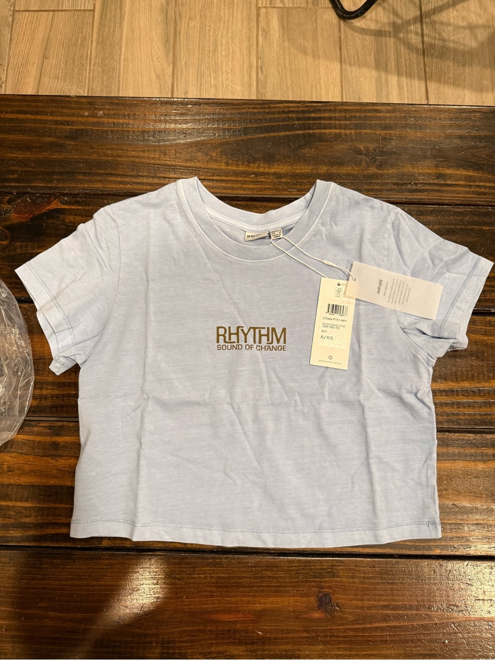 Rhythm. Women’s  ' Light Blue 'Sound of Change' crop Graphic Tee